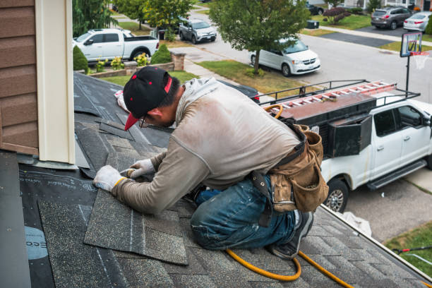 Professional Gutter Repair And Installation technician working in Deer Park, NY